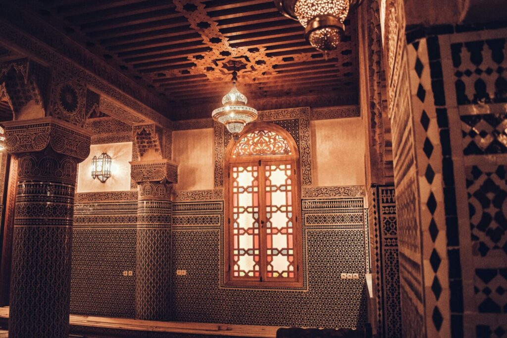 Stunning Moroccan interior showcasing intricate mosaics and Moorish craftsmanship in Fes.