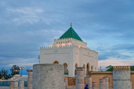 Photo by mohamed aouni Historic Hassan Tower with Mausoleum in Rabat, Morocco at sunset, capturing Moroccan architecture.